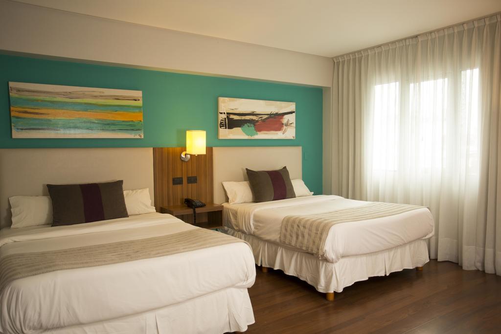 Hotel Bicentenario Suites & Spa San Miguel de Tucumán Værelse billede